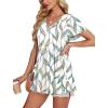 imageOFEEFAN Womens Summer Tops Babydoll Short Sleeve Shirts Puff Sleeve Peplum Tops V Neck T ShirtsNleaf Print